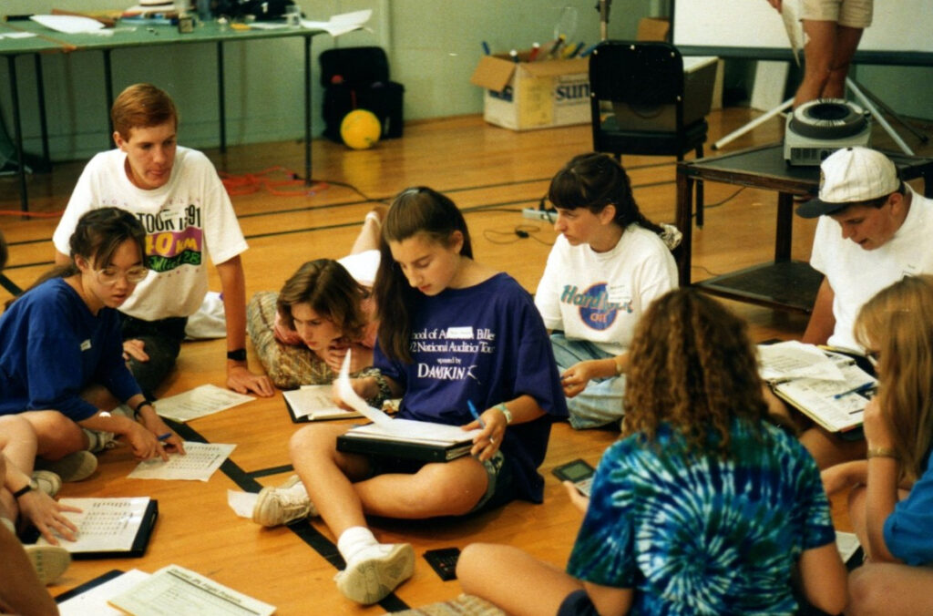 Astronomy Campers collaborate on a project. Joanna Levine at center.