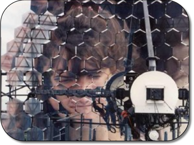 Camper views herself in reflection from the multi-aperture Veritas Gamma Ray Telescope on Mt. Hopkins.