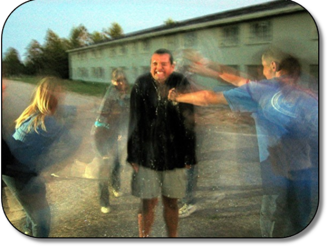 Camp staff gets drenched by Campers.