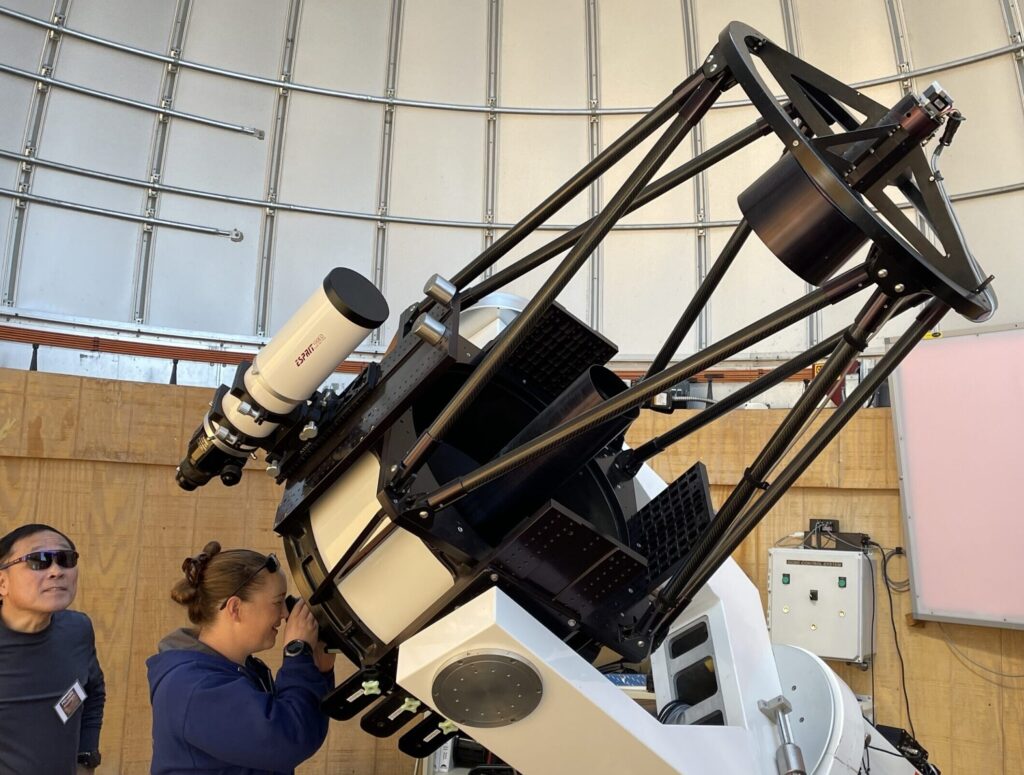 Adult Camper viewing Venus during daytime with the 24" Phillips telescope